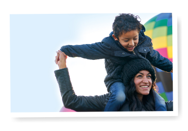 Woman with a child on her shoulders